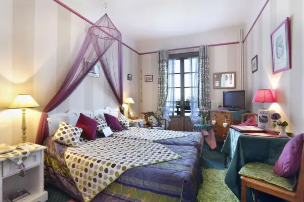 Hôtel Restaurant Les Cygnes - Chambre violette